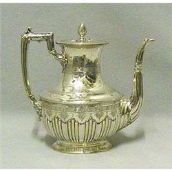 A Victorian teapot and cover, of lobed oval