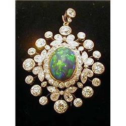 A late Victorian brooch/pendant set with bla
