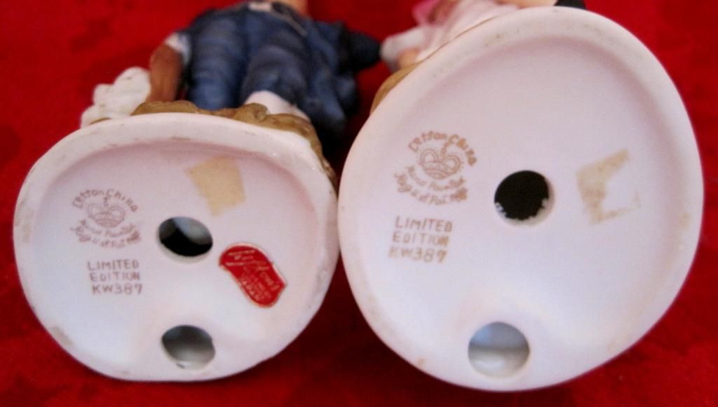 pinky and blue boy figurines