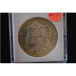 1885-O Silver Morgan $1; MCPCG Graded MS64; EST. $100-200