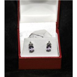Diamond and amethyst earrings