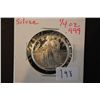 Image 1 : American Precious Metals Exchange Silver Round; .999 Fine Silver 1/4 Oz.; EST. $10-15