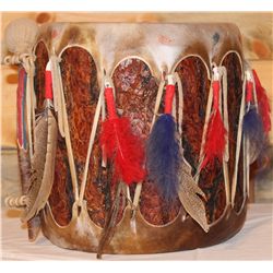 Tree trunk and rawhide drum