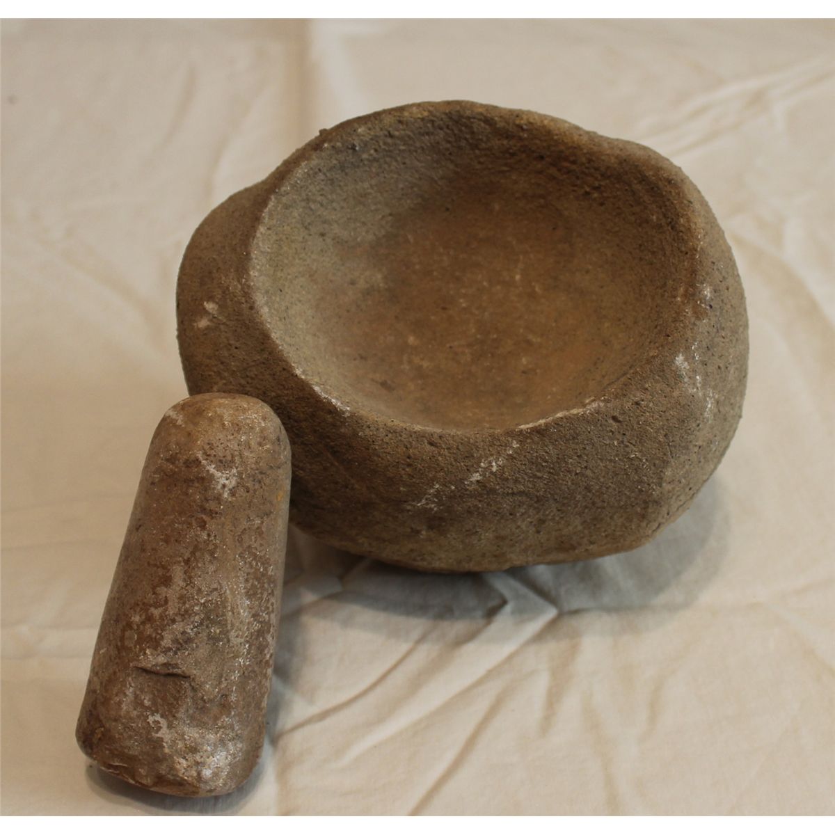 Deeply dished grinding stone