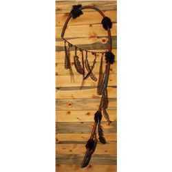 Beaded and adorned Coup stick
