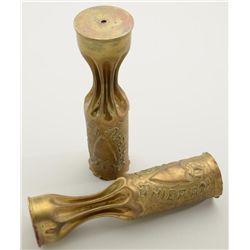 Pair of WW I era “trench art” consisting of  two brass cannon shells that have been  crimped at the 