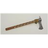 Image 1 : Cast iron axe head with wood shaft that is  decorated with what appears to be copper  coins and bras