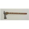 Image 2 : Cast iron axe head with wood shaft that is  decorated with what appears to be copper  coins and bras