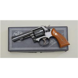 Smith & Wesson Model 10-8 DA revolver, .38  Special cal., 4” barrel, blue finish,  checkered medalli