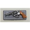 Image 1 : Smith & Wesson Model 10-8 DA revolver, .38  Special cal., 4” barrel, blue finish,  checkered medalli