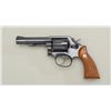 Image 2 : Smith & Wesson Model 10-8 DA revolver, .38  Special cal., 4” barrel, blue finish,  checkered medalli