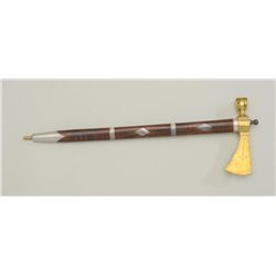 A beautifully made modern copy of an American  Indian pipe tomahawk with engraved brass  head and bo