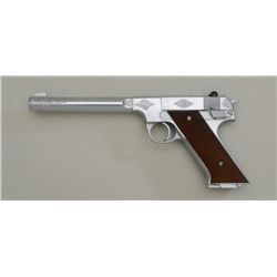 High Standard semi-auto pistol, .22 cal.,  6-3/4” barrel, stainless steel, custom  engraved and sign