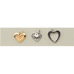 Collection of 3 heart pendants, one in 14k  yellow gold and two in 14k white gold.  Gold  weight 10.