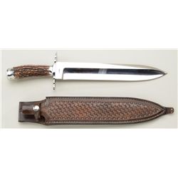 Large custom-made modern bowie knife with  tooled leather sheath, both marked “K.  Draper” approx. 1