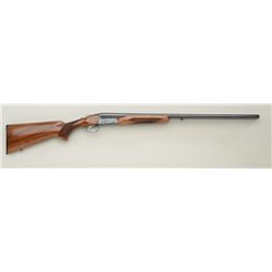 Browning SxS shotgun, 20 gauge, 26” barrels,  blue finish, checkered wood stocks,  #03542RT168. This