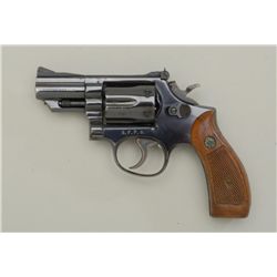 Smith & Wesson Model 19-3 DA revolver, .357  Magnum cal., 2-1/2” barrel, blue finish,  checkered woo