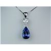Image 1 : Gorgeous 14 karat white gold ladies handmade  necklace set with a fine quality pear shape  Tanzanite