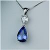 Image 2 : Gorgeous 14 karat white gold ladies handmade  necklace set with a fine quality pear shape  Tanzanite