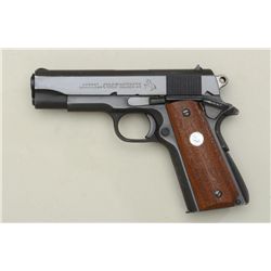 Colt Combat Commander semi-auto pistol, .45  cal., 4-1/4” barrel, blue finish, smooth wood  medallio