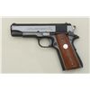 Image 1 : Colt Combat Commander semi-auto pistol, .45  cal., 4-1/4” barrel, blue finish, smooth wood  medallio
