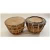 Image 4 : Pair of old drums, each approx. 11” in  diameter and each approx. 9” in height, hide  or sinew strip