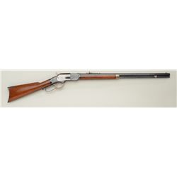 Winchester Model 1873 lever action rifle, .32  WCF cal., 24” octagon barrel, re-blued  finish with r