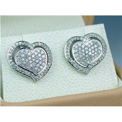 Dazzling 10 karat white gold ladies heart  design earrings set with over 80 round cut  diamonds weig