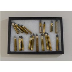 Lot of 18 misc. Sharps cartridges in riker  case including .40-70, .40-90, .45-100-300  Express, .44