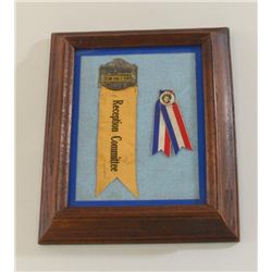 Framed and matted display of two early  reception ribbons/pins for Cowboy and Actor  Tim Holt, one i