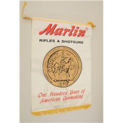 Marlin Firearms advertising banner  commemorating 100 years of service, approx.  28” x 20” overall i