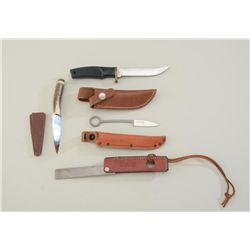 Lot of three knives and a sharpening stone  with leather cover including a Smith & Wesson  stainless