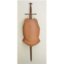 Decorator metal breast plate armor and  two-handed sword approx. 4 feet in length,  16” wide and 8” 