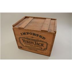 Lot of three advertising pieces for the  Canadian Whiskey, Yukon Jack including a wood  shipping cas