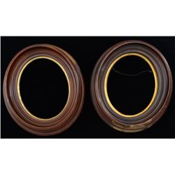 Pair of antique curved and jointed wood with  original gilt liners. Hardwood-some damage to  finish 