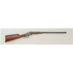 Stevens single shot rifle, .32 Long cal., 22”  barrel, blue finish, wood stocks, #836. This  gun is 