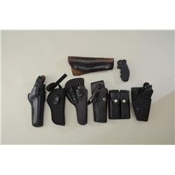 Misc. lot including six misc. holsters, a  pair of Hogue monogrips for a small frame  revolver and a