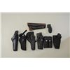 Image 1 : Misc. lot including six misc. holsters, a  pair of Hogue monogrips for a small frame  revolver and a