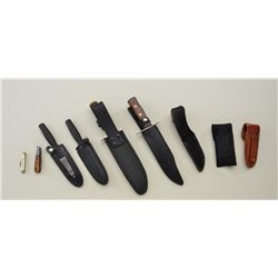 Lot of nine misc. knives including two modern  Fury brand belt knives with leather sheaths;  two mod