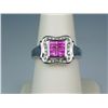 Image 1 : Stylish 10 karat white gold ladies ring  invisible set with four pink sapphires and  channel set wit