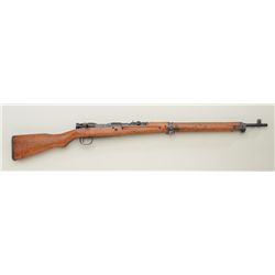 Japanese Arisaka bolt-action rifle, 7mm cal.,  26” barrel, military blue finish, wood  stock, ground