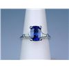 High quality 14 karat white gold ladies ring  set with a cushion cut cobalt blue sapphire  weighing 