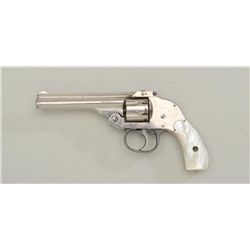 H&R DA hammerless revolver, .22RF cal., 4”  barrel, nickel finish, pearl grips, #6220.  This gun is