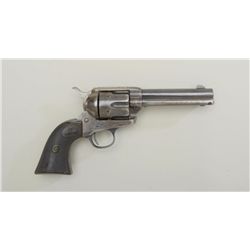 Colt SAA revolver, .32 WCF cal., 4-3/4”  barrel, blue and case hardened finish, black  checkered har