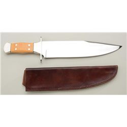 Massive bowie knife by Lee with exotic wood  grip and leather sheath, approx. 20-1/2”  overall and a