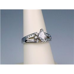 Very high quality 14 karat white gold ladies  ring set with a GIA certified MQ cut diamond  weighing