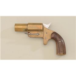 French brass flare pistol with checkered wood  grips in overall very good condition;  missing lanyar