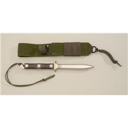 EK Commando knife and sheath, Model 4P, like  new in box, commemorating WW II, Korea and  Vietnam.  