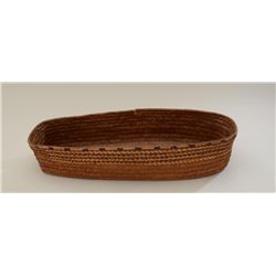 Large woven Indian basket approx. 5” tall,  approx. 26” long and approx. 10” wide in  overall fair t