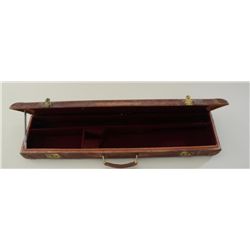 Leather suitcase style shotgun case with tag  marked “Purdey Bbl 30” 19712” in overall good  conditi